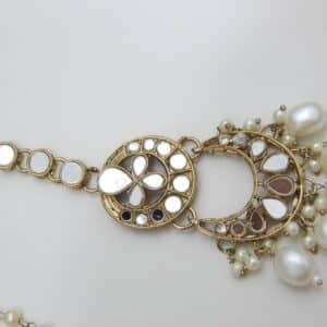 An ethnic mirror work chandbali earring and maang tikka set with beaded drops and small pearls