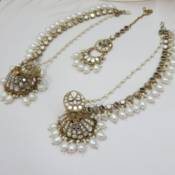 An ethnic mirror work chandbali earring and maang tikka set with beaded drops and small pearls