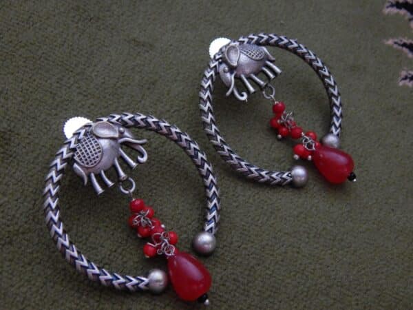 Oxidised elephant hoop earrings in red with beaded drop