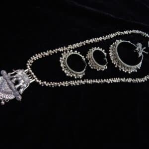 Complete German Silver tribal jewelry set: Long ghungroo beaded necklace with elephant pendant and two pairs of matching oxidized jhumka hoops.
