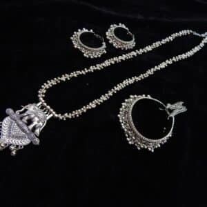 Complete German Silver tribal jewelry set: Long ghungroo beaded necklace with elephant pendant and two pairs of matching oxidized jhumka hoops.