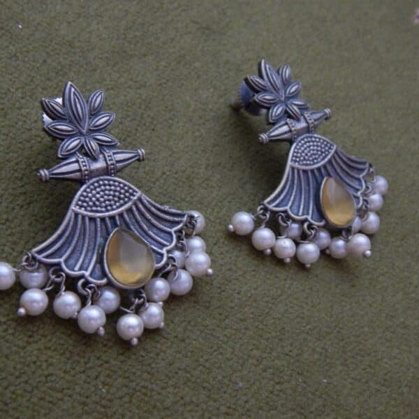 Oxidised lotus drop earrings in amber yellow with pearl fringe