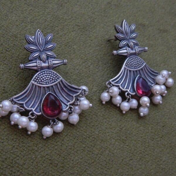 Oxidised lotus drop earrings in ruby red with pearl fringe