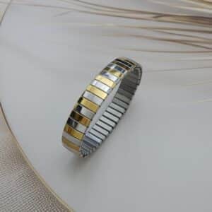 stainless steel gold stretch bracelet standing upright – Royal Reflection Dazzling Studio.