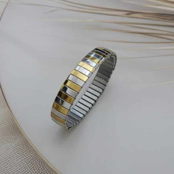 stainless steel gold stretch bracelet standing upright – Royal Reflection Dazzling Studio.