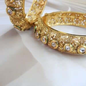 Traditional gold-plated filigree Kundan kada with antique design and clear stones – Devika Heritage Kada by Royal Reflection Dazzling Studio.
