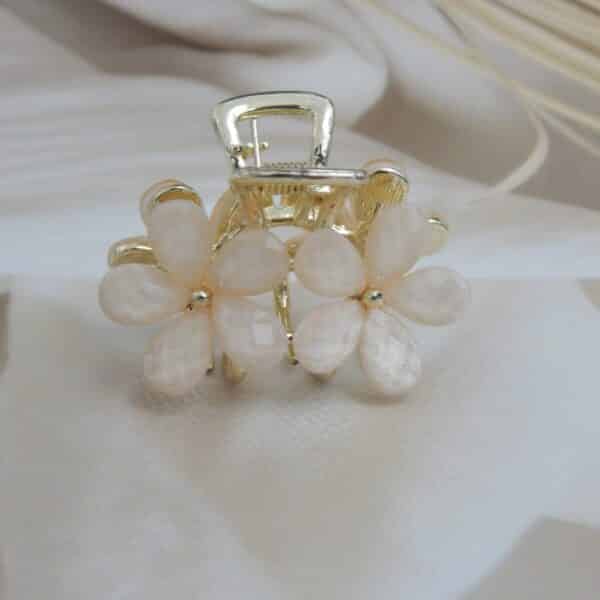 Navratri Purple Jewellery - Royal Reflection DS front view of Small gold-toned hair claw clip with a cluster of pink faceted floral stones, elegant hair accessory for women.