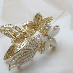 Pearl-studded golden flower hair clip for women – Royal Reflection Dazzling Studio.