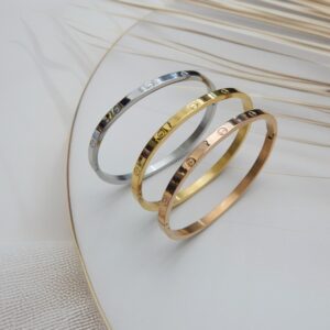 Trio of anti-tarnish steel screw bracelets in metallic finishes – Royal Reflection Dazzling Studio.