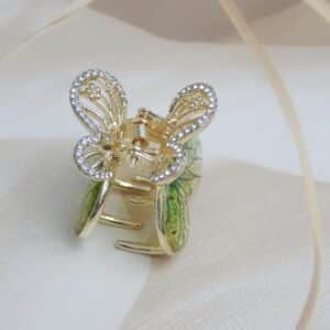 Green butterfly hair claw with sparkling stones – Royal Reflection Dazzling Studio.