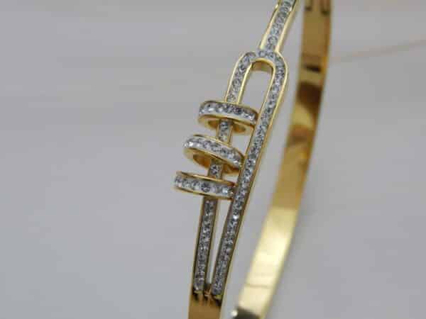 Gold spiral stone kada with crystal detailing – Vamika Kada.