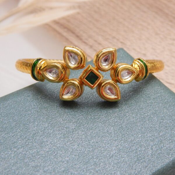 Gold-plated kada with green square centre stone and vertical kundan floral design – Aarunya Green Kundan Vertical Kada.