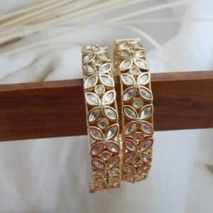 Charita floral polki kada set in antique gold finish with American diamond stones
