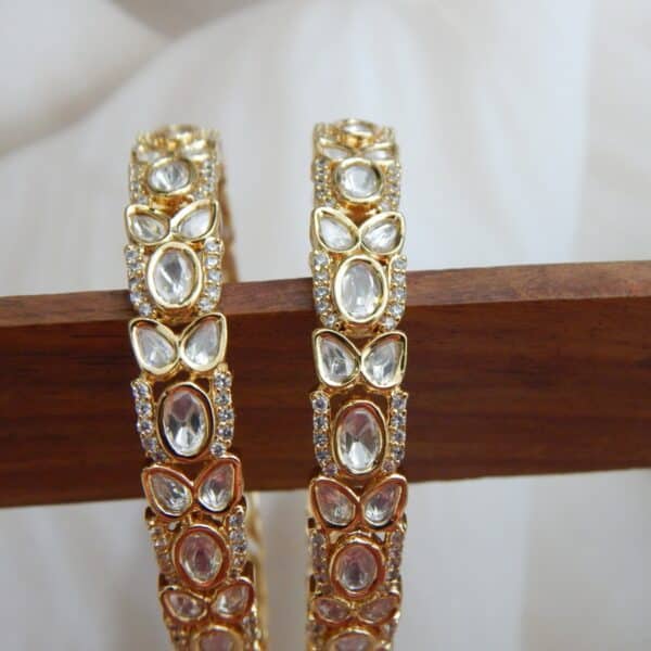Devika polki royal kada set in antique gold finish with American diamond border