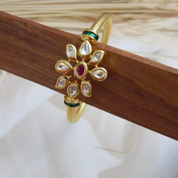 Gold-plated kada with ruby centre stone and kundan floral design – Ridhima Ruby Kundan Floral Kada.