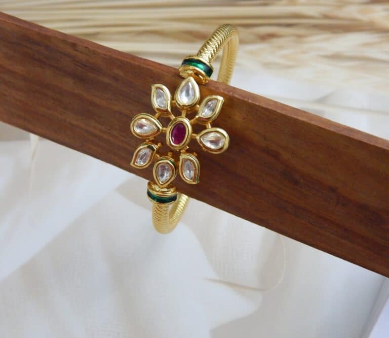 Gold-plated kada with ruby centre stone and kundan floral design – Ridhima Ruby Kundan Floral Kada.