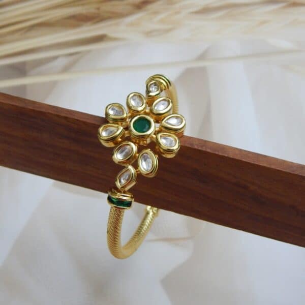 Gold-plated floral kundan kada with green center stone – Samaira Kundan Floral Kada.