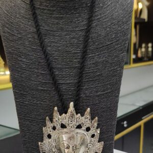 Oxidised goddess face pendant necklace on black dori cord