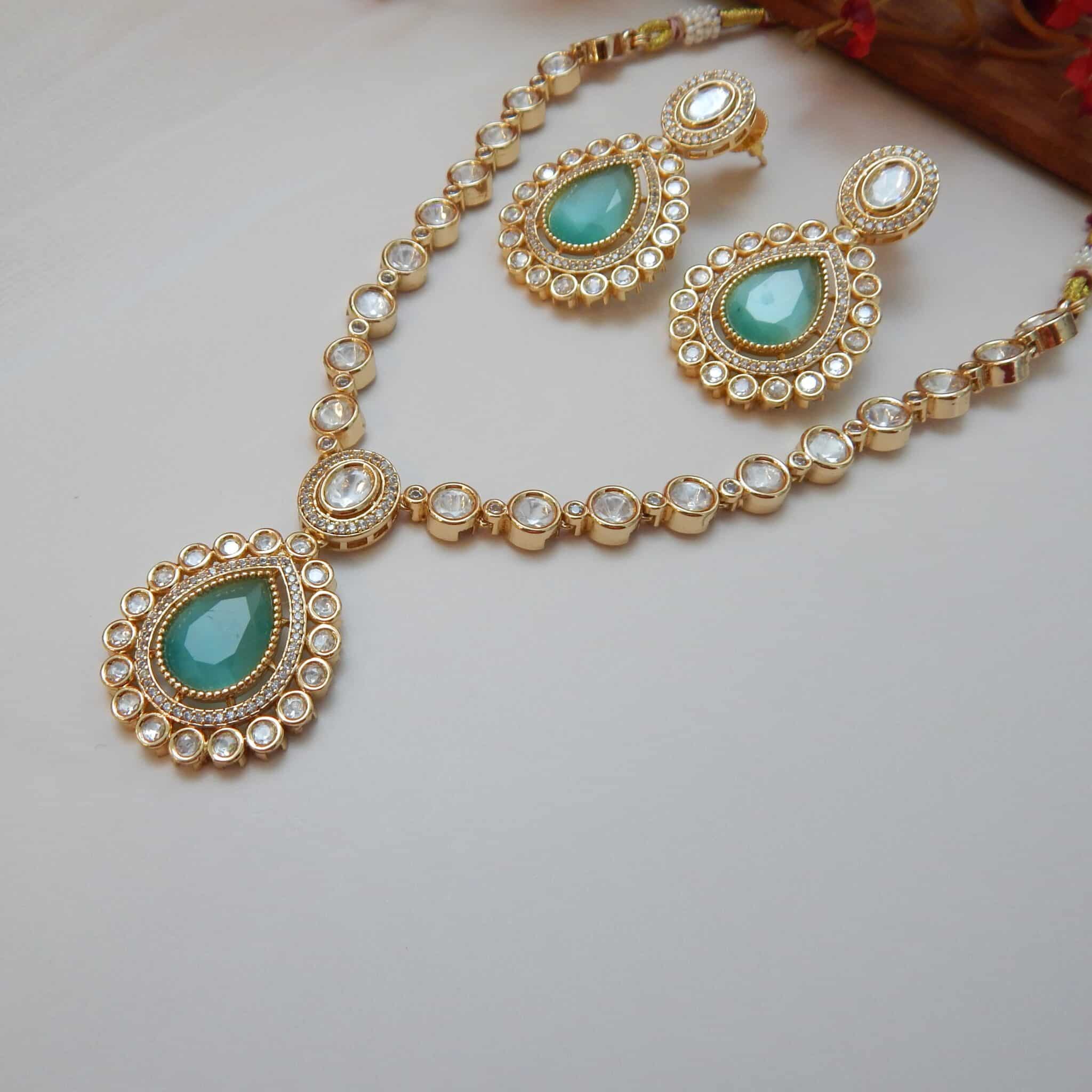 Home - Royal Reflection DS Tejaswini mint green polki pendant necklace set with matching earrings
