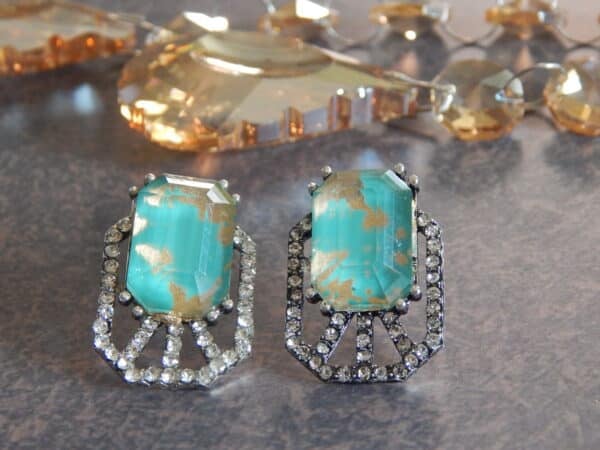 Art deco cage stud earrings in smoky teal with American diamond cage