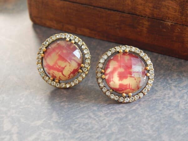 Double halo stud earrings in red with American diamond ring
