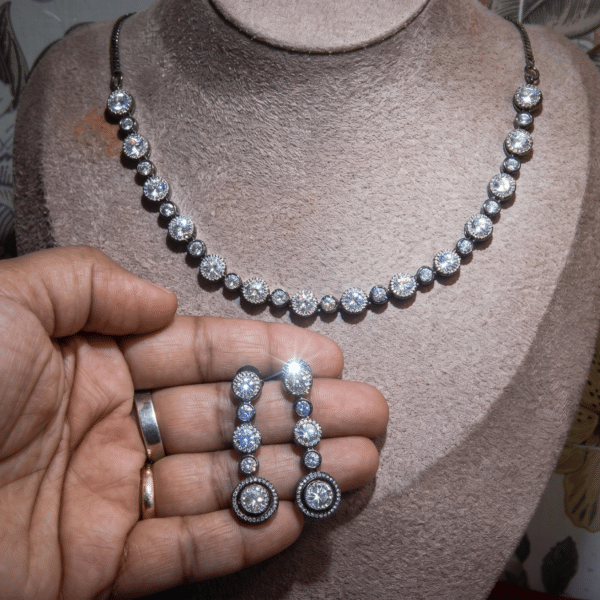 Victorian halo necklace set with graduated American diamond stones and matching drop earrings