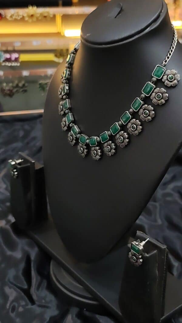 Oxidised floral necklace set in emerald green with matching earrings