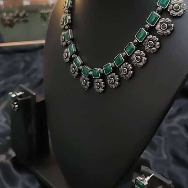 Oxidised floral necklace set in emerald green with matching earrings