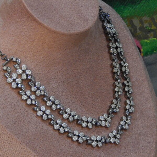 Victorian floral necklace set with pave-set American diamond clusters and matching leaf drop earrings