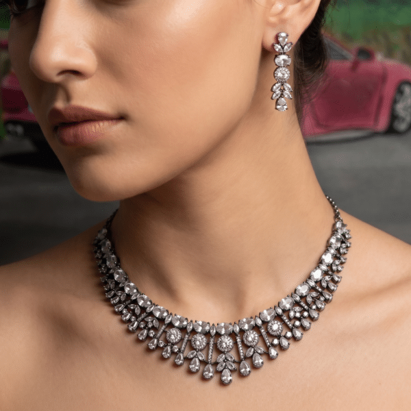 Victorian fringe necklace set with cascading American diamond stones and matching drop earrings (worn shot)