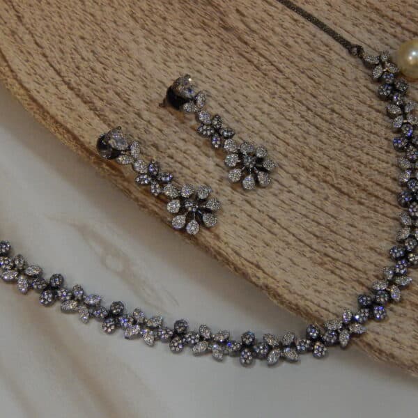 Victorian garland necklace set with marquise and floral clusters and matching drop earrings