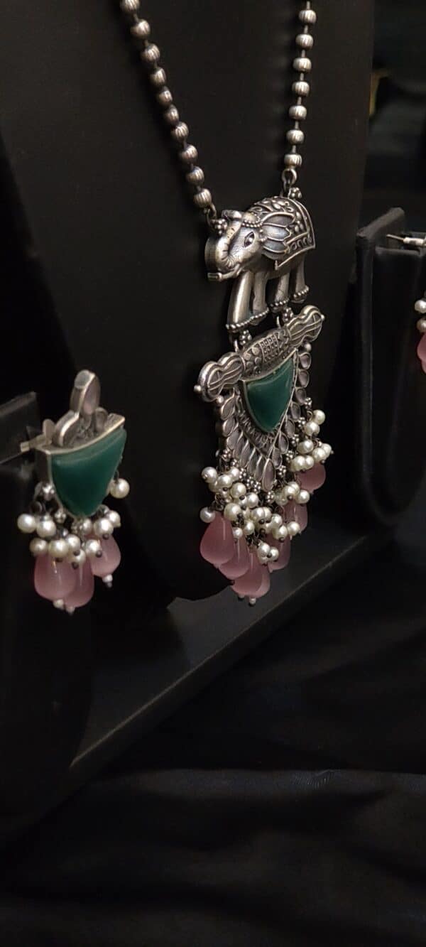 Oxidised elephant green stone necklace set with pearl and pink stone fringe
